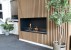 Foco One 1200 bioethanol fireplace with black finish, designed for built-in one-sided installation.