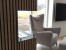 Foco Corner Left 800 bioethanol fireplace in black finish with a two-sided view for modern interiors.