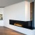 Forma 1000 Right Corner bioethanol fireplace in a sleek black finish, designed for built-in installation with remote control fun