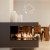 Forma 1000 Room Divider bioethanol fireplace in black with remote control for modern interiors.