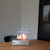 ScandiFlames Circular Table Bio Fireplace in steel with a stylish glass frame for tabletop use.