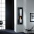 Safretti Riviera LE GL wall-mounted bioethanol fireplace in stainless steel and black with manual control.