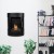 Oregon Wall-mounted Bioethanol Stove by ScandiFlames in black, featuring a sleek design with a 1-litre fuel capacity and manual 