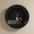ScandiFlames Round Black Bioethanol Fireplace – Wall-mounted, manual control, 1.5L capacity, 6-hour burn time, black finish.