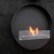 Delaware XL black Ø80 cm by ScandiFlames – a stylish wall-mounted bioethanol fireplace with a sleek black finish, offering a 7-h