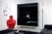 Safretti Nemo Black wall-mounted bioethanol fireplace with a sleek design and manual control.