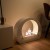 ScandiFlames Bio Fireplace with Arch - White, a modern floor-standing bioethanol fireplace with a sleek curved design and manual