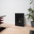 Carson Small Bioethanol Stove Fireplace by ScandiFlames in black, featuring a modern Scandinavian design with manual control.