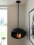 Cocoon Aeris Matte Black with Black Rod – a ceiling-mounted bioethanol fireplace with a sleek matte black finish and modern desi