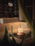 Dancing Flames Table Fireplace in cork finish, featuring a stylish design with a real flame effect and a manual control system.