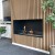 Foco One 1200 bioethanol fireplace with black finish, designed for built-in one-sided installation.