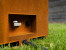 Galio Corten outdoor gas fireplace with rust-finish and manual control.