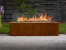 Galio Corten outdoor gas fireplace with rust-finish and manual control.