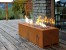 Galio Corten - Automatic outdoor gas fireplace with a rusted corten steel finish, app and remote-controlled operation.