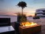 Galio Corten - Automatic outdoor gas fireplace with a rusted corten steel finish, app and remote-controlled operation.