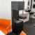 ScandiFlames Open 3-Sided Bio Fireplace - Black, a modern freestanding bioethanol fireplace with a three-sided open view and man