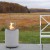 Planika Jar with Concrete Base – Stylish freestanding bioethanol fireplace in white with a concrete base for outdoor use.