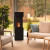 Planika Arcticon Black freestanding bioethanol fireplace with automatic control and sleek black finish.