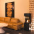 Planika Arcticon Black freestanding bioethanol fireplace with automatic control and sleek black finish.