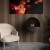Bubble Wall bioethanol fireplace – a sleek, wall-mounted black fireplace with remote control and automatic operation.