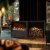 Planika Cottage Freestanding BEV Fireplace in sleek black finish, featuring BEV technology for a clean burn.