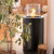 Planika Mandala bioethanol fireplace in black, a stylish floor-standing model with a 1.5L capacity and 3.5-hour burn time.