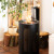 Planika Mandala bioethanol fireplace in black, a stylish floor-standing model with a 1.5L capacity and 3.5-hour burn time.