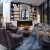 Panorama Single-sided bioethanol fireplace in black with remote and app control, offering a sleek built-in design and 7 kW heat