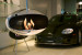 Cocoon Aeris Polished Steel ceiling-mounted bioethanol fireplace with a sleek steel pole, offering modern elegance and efficient