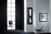 Safretti Riviera LE GL wall-mounted bioethanol fireplace in stainless steel and black with manual control.