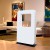 Safretti Curva XT - White floor-standing bioethanol fireplace with a minimalist design and 6-8 hour burn time.