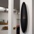 Safretti Prometheus PB - Black wall-mounted bioethanol fireplace with a sleek design and long-lasting burn time.
