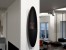 Safretti Prometheus PG Grey wall-mounted bioethanol fireplace with a sleek grey and black design, 1.7L capacity, and manual cont