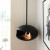 Cocoon Aeris Matte Black with Black Rod – a ceiling-mounted bioethanol fireplace with a sleek matte black finish and modern desi
