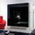 Safretti Nemo Black wall-mounted bioethanol fireplace with a sleek design and manual control.