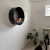 Delaware Black Round Wall Mounted Biofireplace by ScandiFlames - A modern, space-saving bioethanol fireplace with a sleek black