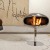 Cocoon Pedestal - Polished Steel bioethanol fireplace with a sleek, freestanding design and polished steel finish.