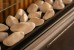 Tray of White Ceramic Stones by Planika, a premium decorative accessory for bioethanol fireplaces.